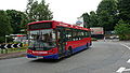 English: Surrey Connect AE06 XRM, a MAN 14.220/MCV Evolution, on The Stations Roundabout, Redhill, on route 540, heading for the bus station.