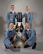 Ortrait of the Gemini-7 prime and backup crew members around a model of the Gemini-7 spacecraft.jpg