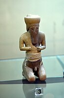 Statue of a Sumerian seated worshiper from Tell Asmar