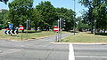 English: A piece of bus lane, over the middle of Tushmore Roundabout in Crawley, helping buses get past other traffic. A stretch of guided busway leads up to its northern side, and Fastway buses are able to drive over the middle to the southern side. Tushmore Roundabout is at the junction of the A23 road, and the A2011 and A2219. This is part of the Crawley Fastway guided bus system.