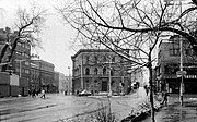 Partially shielded from snipers by stacked shipping containers (left), pedestrians and a solitary car hurry across the lethal Skenderija junction on Maršala Tita (Marshal Tito Street), which becomes Vojvode Putnika, or ‘Sniper Alley’, the road to the airport. At far right, Ðure Ðakovića soon climbs uphill, making it an easy target above the containers.