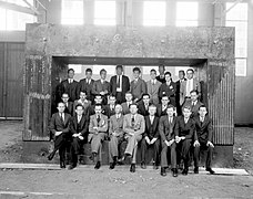 Early Radiation Laboratory staff framed by the magnet for the 60-inch cyclotron in 1938.jpg