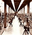 Control panels and operators for calutrons at the Y-12 Plant in Oak Ridge, Tennessee. During the Manhattan Project the operators worked in shifts covering 24 hours a day.