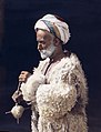 Ramallah man spinning wool, 1919