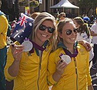 Nina Curtis and Olivia Price at the Welcome Home parade in Sydney.jpg