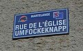 Rue de l’Église / Umfockeknapp bilingual street sign in Martelange