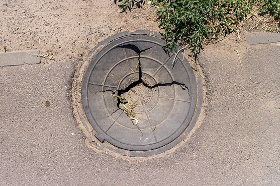 Damaged manhole cover