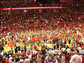 Students and fans rush the court after the unranked Red Raiders upset the #5 Texas Longhorns in 2008.