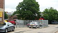 English: Carousel Buses depot in High Wycombe, Buckinghamshire. It is situated in Westbourne Street. It is actually a in the background, further down this road, and has nothing to do with the silver railings, but I didn't know whether I was allowed down the road so took the photo from the junction.