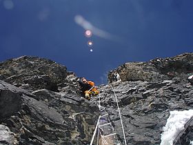 Climbing ladders on Abruzzi Spur