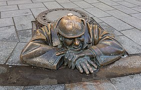 Statue of Man at Work (called "Čumil" in Slovakian), Bratislava, Slovakia.