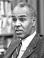 Wilkins being interviewed, 1963.