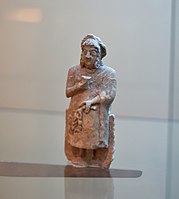 Statuette of a seated Sumerian female worshiper from Diyala Region, Iraq