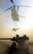 Chinook Delivers Artillery During Oman Exercise in 2001 MOD 45141714.jpg