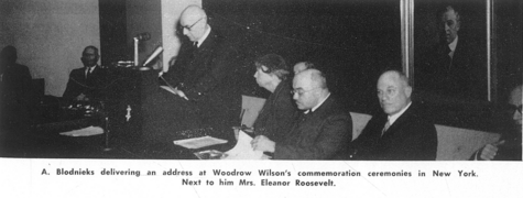 A.Blodnieks delivering an address at Woodrow Wilson's commemoration ceremonies in New York. Next to him Mrs. Eleanor Roosevelt.png