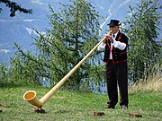 Alphorn player in Nendaz