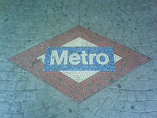 Madrid Metro logo mosaic at Lago station.