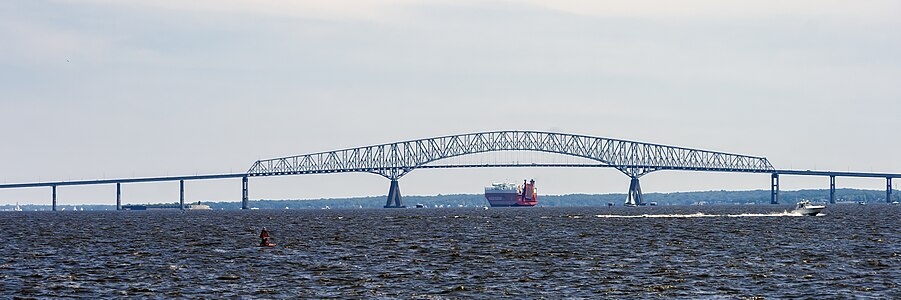 Francis Scott Key Bridge, seen from the west, with the collision point on the right of the image