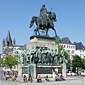 equestrian statue in Cologne (1878) with 16 pedestal figures by Gustav Blaeser