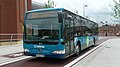 English: Arriva The Shires 3921 (BK58 URO), a Mercedes-Benz Citaro, in Station Way, waiting for the traffic lights to change so it could cross Friarage Road, into Great Western Street/Aylesbury bus station, Aylesbury, Buckinghamshire, on route 300. Aylesbury depot operate into High Wycombe on route 300 with a batch of these Citaros.