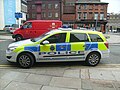 Merseyside Police Dog Unit parked on double yellow lines outside Liverpool Magistrates court.