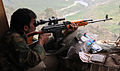 Afghan National army (ANA) soldier fires a PSL sniper rifle in Kunar province, Afghanistan.