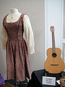 Julie Andrews "Maria" costume & Goya guitar signed by Andrews - Debbie Reynolds Auction.jpg