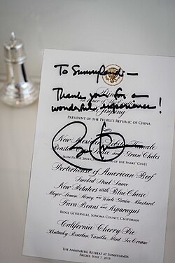 A dinner menu signed by President Obama