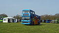 Southern Vectis 639 Steephil Cove (R739 XRV), a Volvo Olympian/Northern Counties Palatine. It was on display, until it had to go and replace 637 from Bustival Shuttle duties, after 637 broke down. It is seen here driving across the field to leave the show, heading to rescue 637.}}