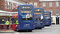 English: Three Wilts & Dorset Scania OmniCitys in Salisbury, Wiltshire, bus station. On the left is 1135 (HF09 BJO), on route 5, in the middle 1133 (HF09 BJJ), on route 8 (Activ8), and on the right 1118 (HF58 GYW), on route X3. Unfortunately 1118 is the unbranded spare for the X3, if it was an X3 route branded example I would have manged an example of the rears of each type of branding all lined up!