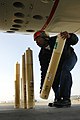 An AO loading sonobuoys into a P-3 Orion