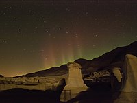 1. Hoodoos just outside Drumheller Alberta. A geological formation of white sandstone cap rocks overlying dark brown marine shale bodies. Author: Keith E. Doucet