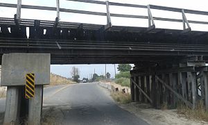 Heading east; 3rd RR bridge over E 60th Ave, Commerce City, CO.jpg