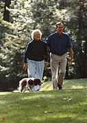 President and Mrs Bush walk with Millie at Camp David 767.jpg