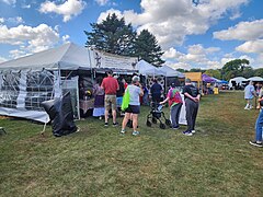 Littlewinds Favorites Indian fast food booth at Mahkato Wacipi 2023 wide angle.jpg