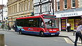 English: Wilts & Dorset 2620 (R620 NFX), an Optare Solo, in Blue Boar Row, Salisbury, Wiltshire, parked in a bus layby.