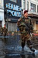 2005 - English: Armed US Soldiers on patrol in ankle deep water on Canal Street, New Orleans after Hurricane Katrina