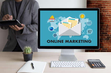 Online marketing man on computer advertisement social on line market word startup marketing online project