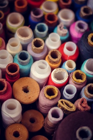 Many spools of thread multi colored thread preparation for sewing needlework hobby