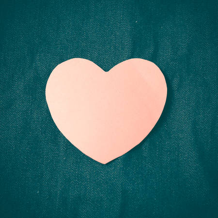 Red heart on jean retro vintage style Stock Photo