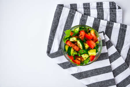 Bowl of fresh salad with tomato cucumber letture flax seeds vegetarian food healthy eating low calorie diet concept vegan food copy space