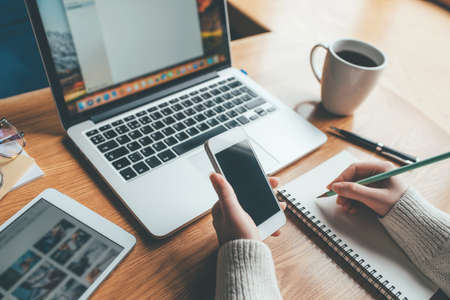 Young woman working in a home office remote work concept