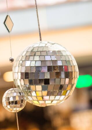 Disco balls with mirror pieces for dancing in a disco club Stock Photo