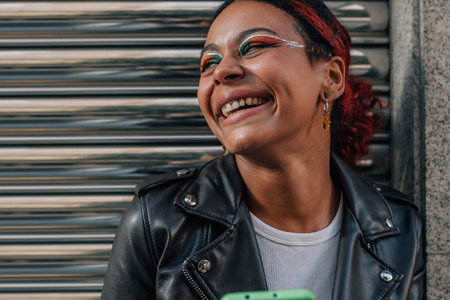 Portrait of girl on the street with mobile phone Stock Photo