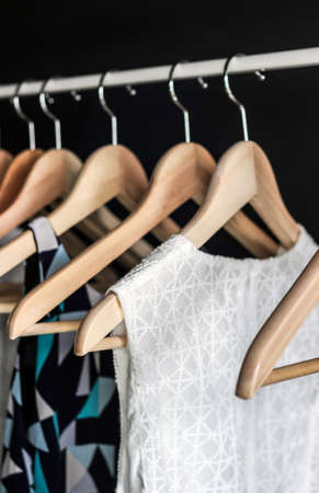 Woman clothes hanging in a row