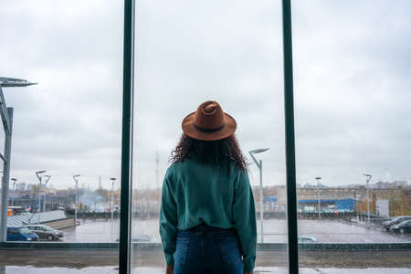 Yong african descent woman rear view portrait at hall Stock Photo