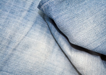 Texture of blue jeans textile