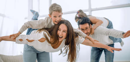 Parents have fun with their children on a free evening