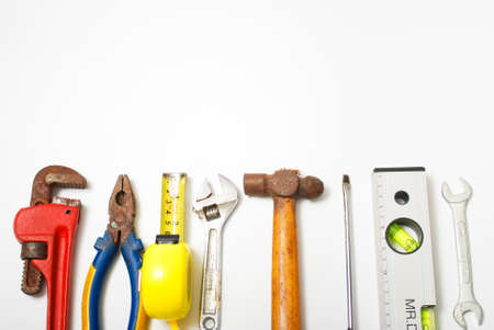 Assorted work and home tools isolated white background and copy space Stock Photo