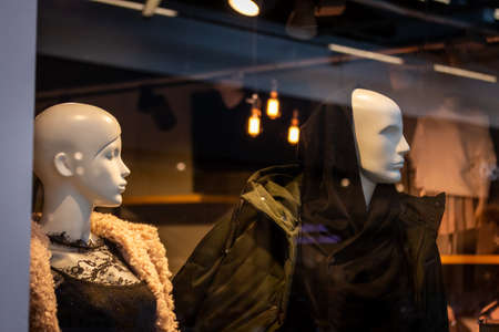 Mannequins in a small clothing store Stock Photo